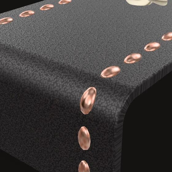 The waterfall fold in black leather, the thread stud run curving over it